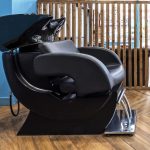 black-hairdresser-s-chair-with-porcelain-basin-washing-hair_449839-19094