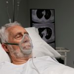 senior-man-with-respirator-hospital-bed_23-2149011213 (1)